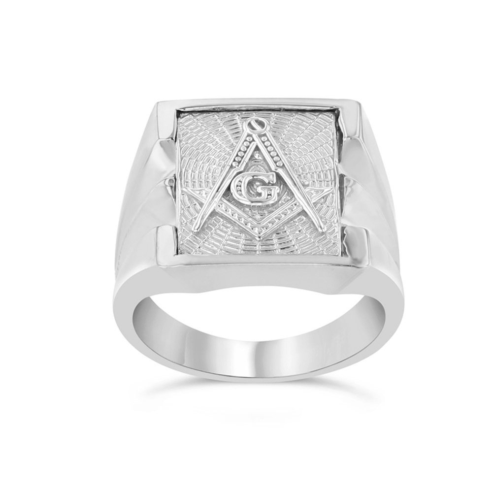 A Masonic ring engraved with the square and compasses