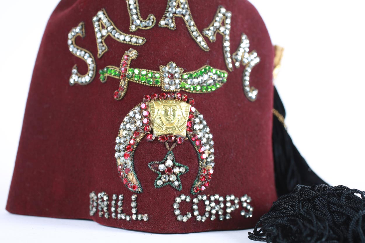 A red fez hat associated with the Shriners